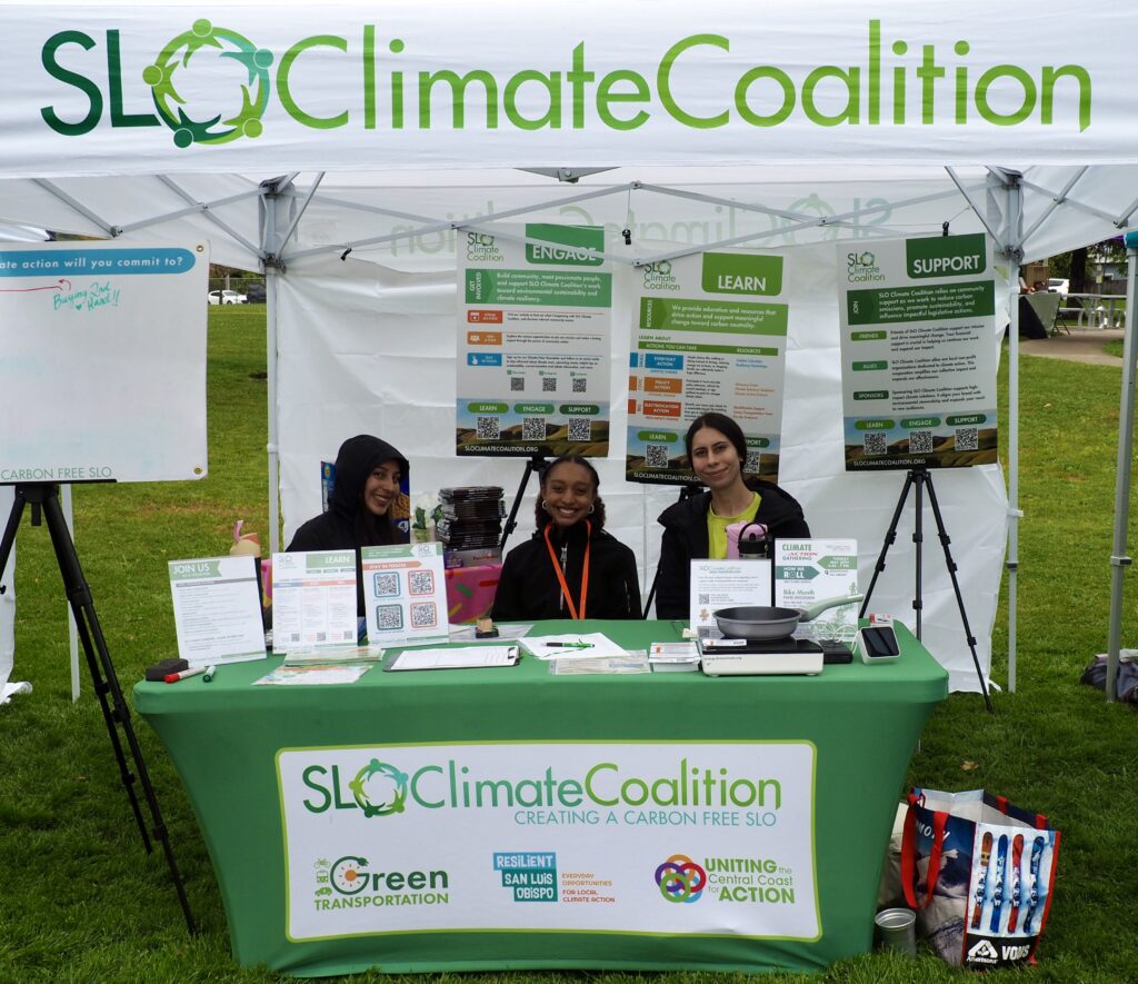 SLO Climate Coalition volunteers at EarthFest event promoting climate action.